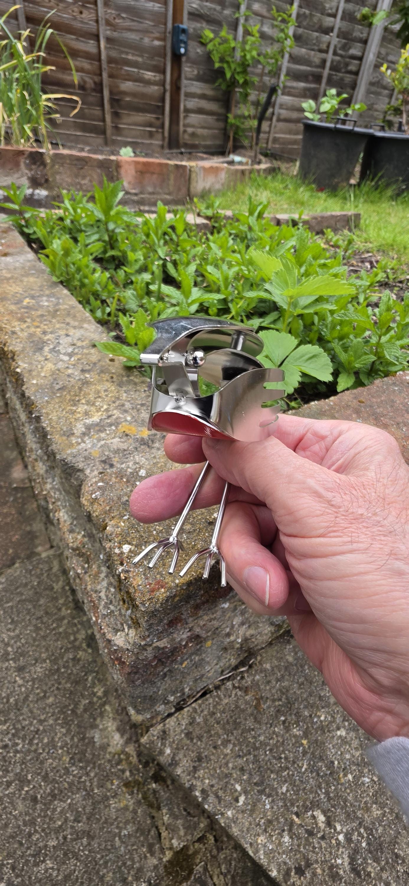 Stainless Steel Robin made from forks, and spoons.
