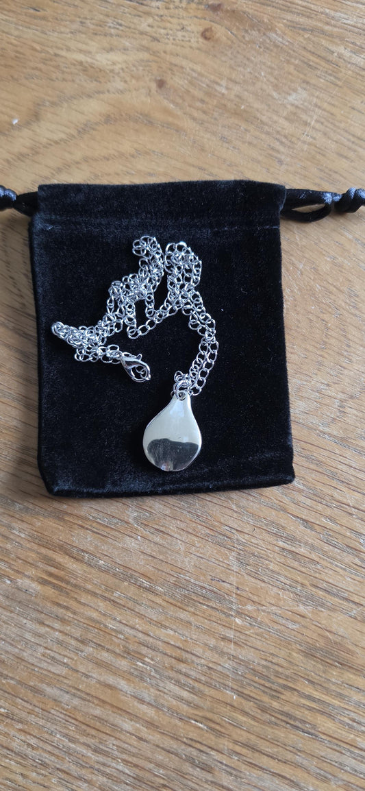 Silver plated fork made into pear shaped pendant with 20 inch stainless steel chain