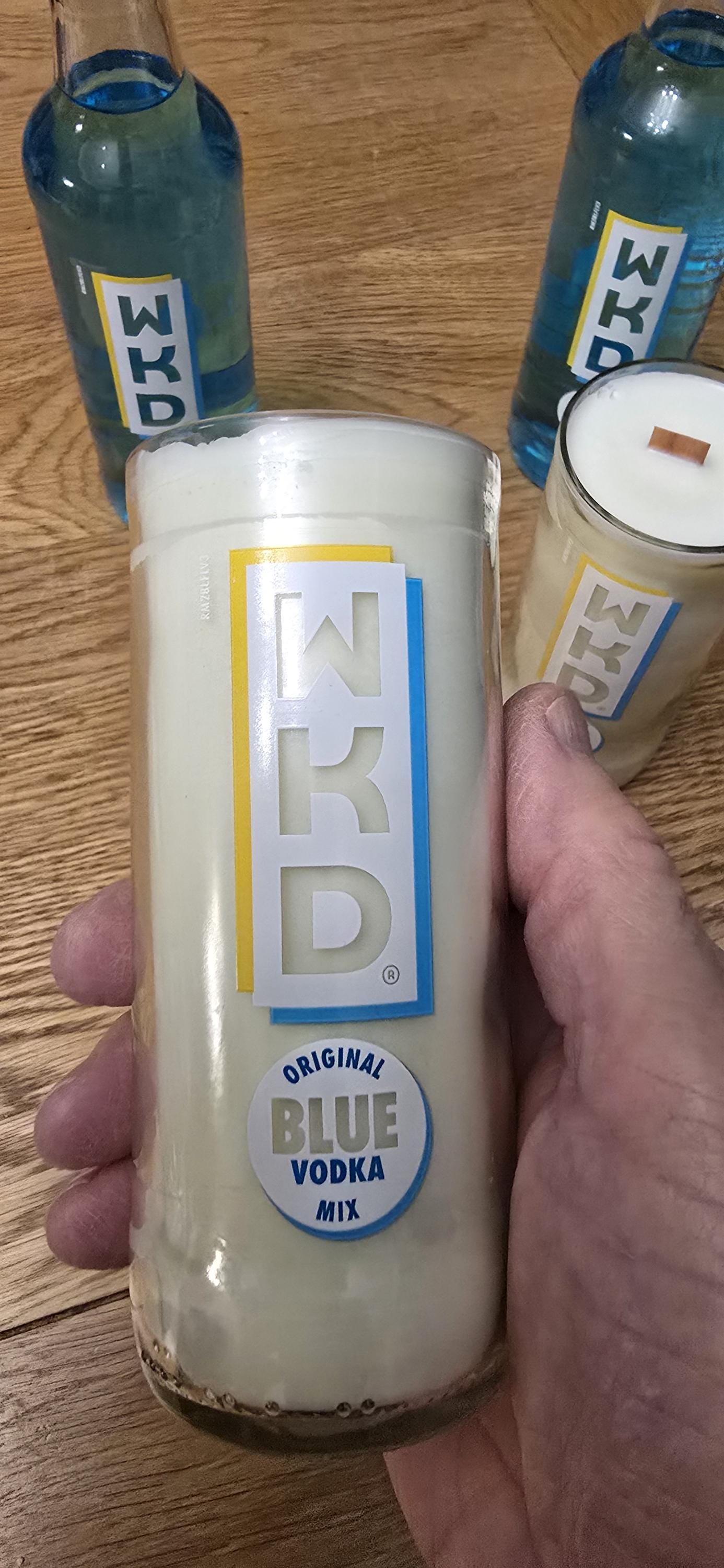 WKD Blue upcycled bottle glass Made into a candle with crackle wick