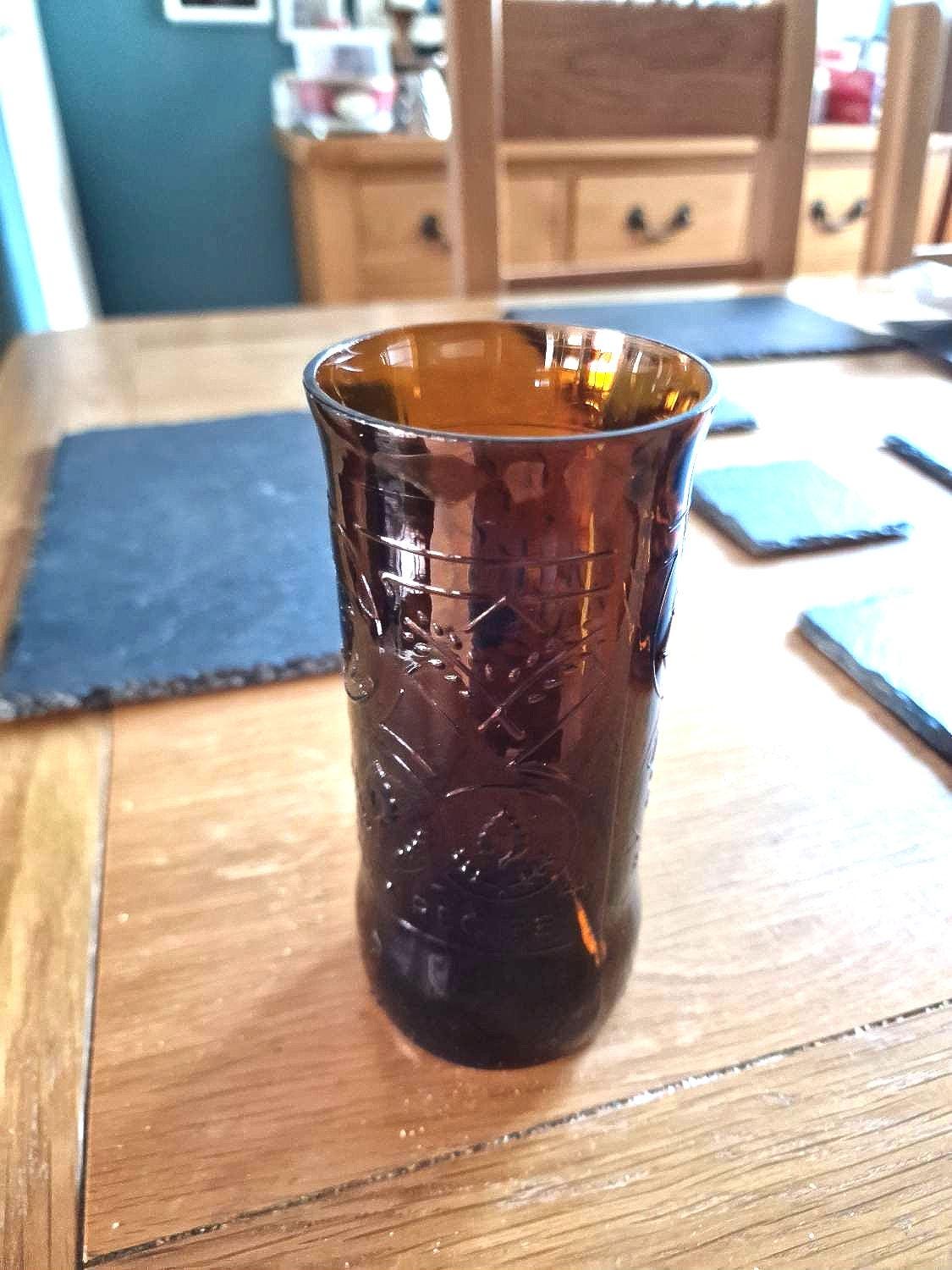 1 x upcycled Cobra 620ml beer bottle made into a glass.  Holds approx 400ml of liquid.