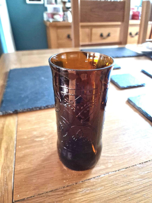 1 x upcycled Cobra 620ml beer bottle made into a glass.  Holds approx 400ml of liquid.