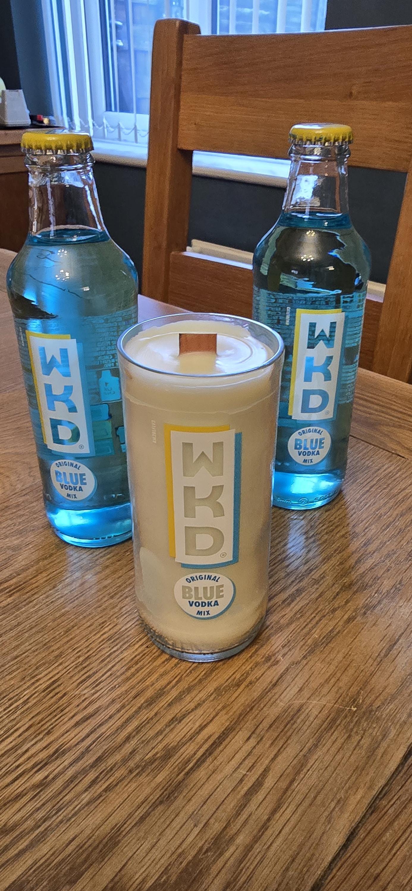 WKD Blue upcycled bottle glass Made into a candle with crackle wick