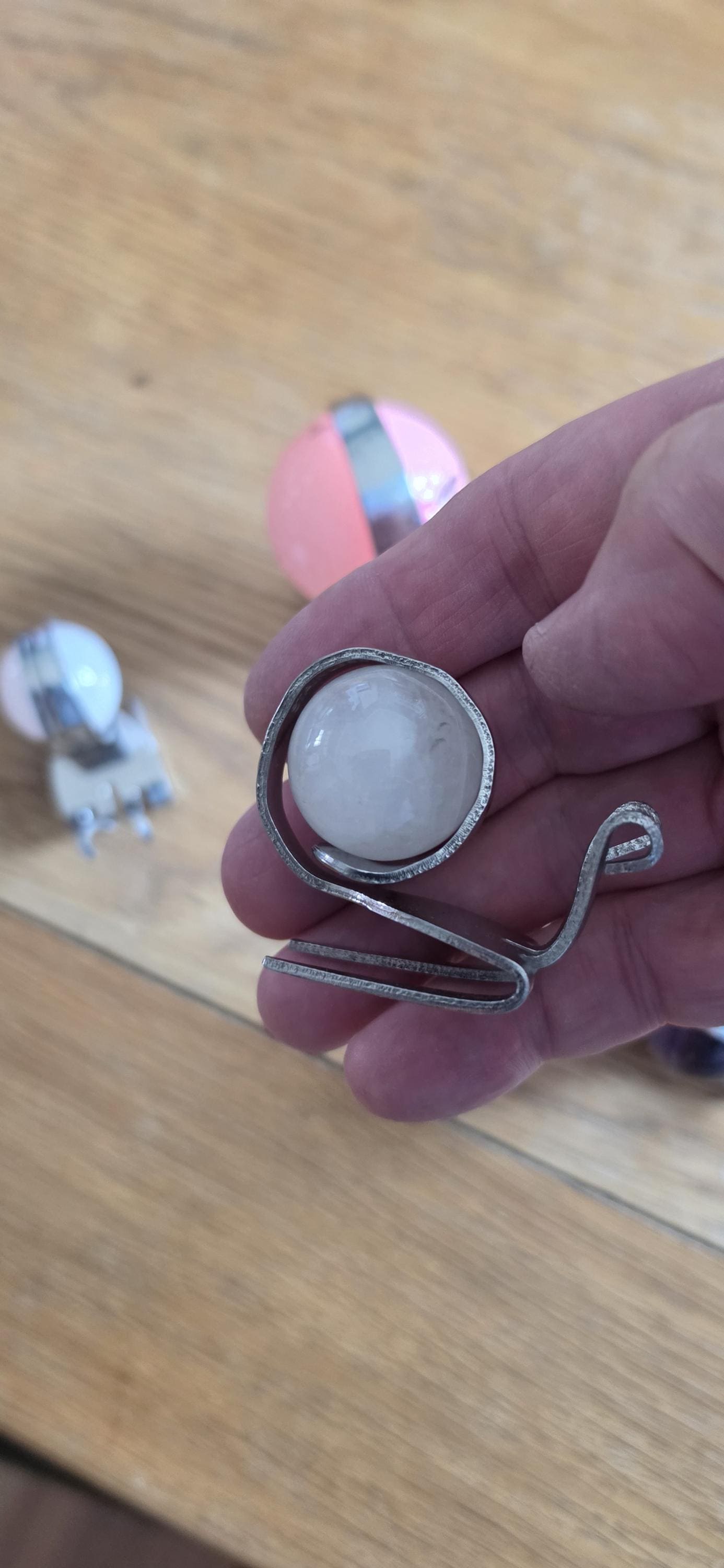 Small snail made from a dessert fork and large marble