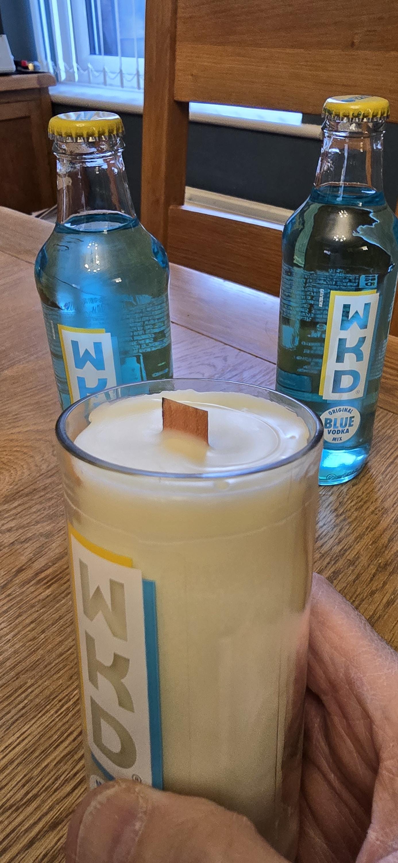 WKD Blue upcycled bottle glass Made into a candle with crackle wick