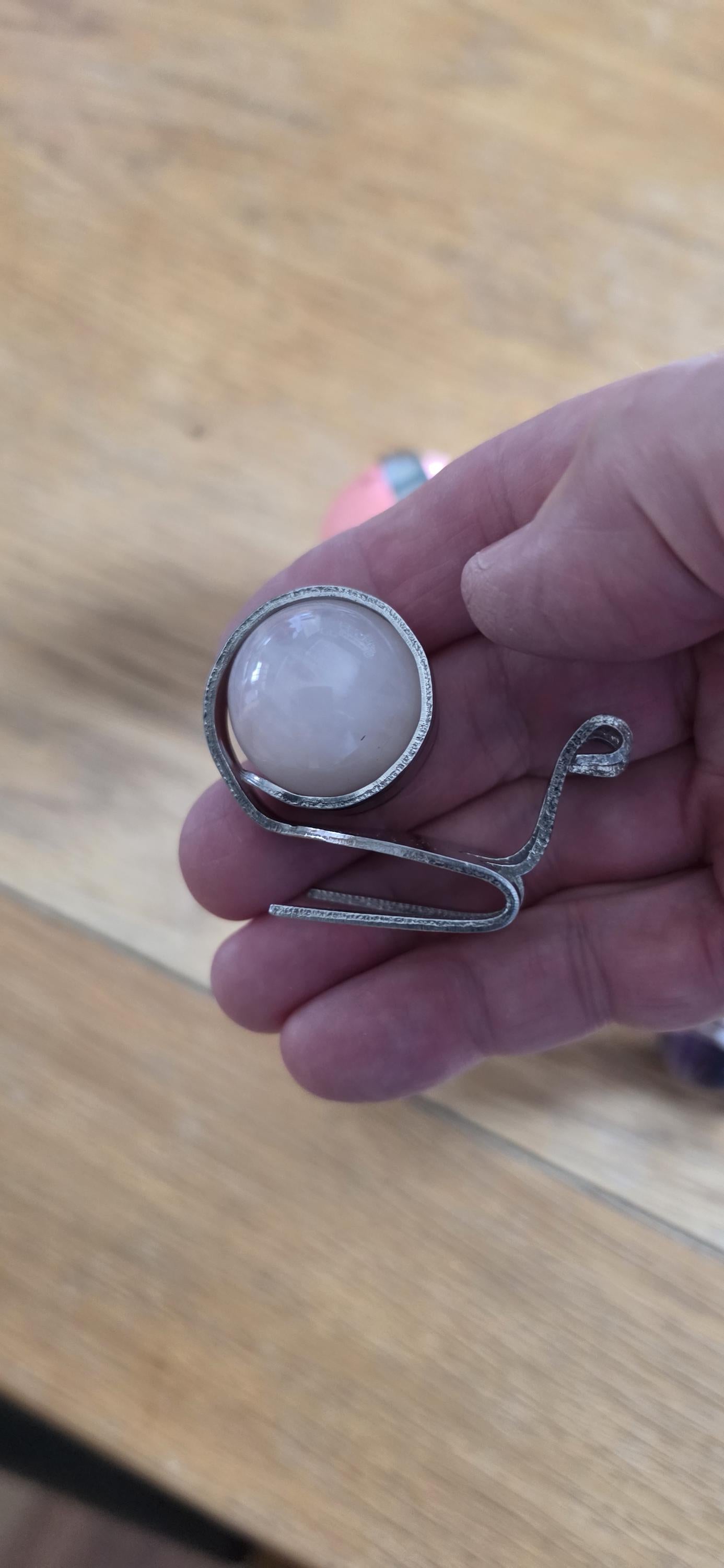 Small snail made from a dessert fork and large marble