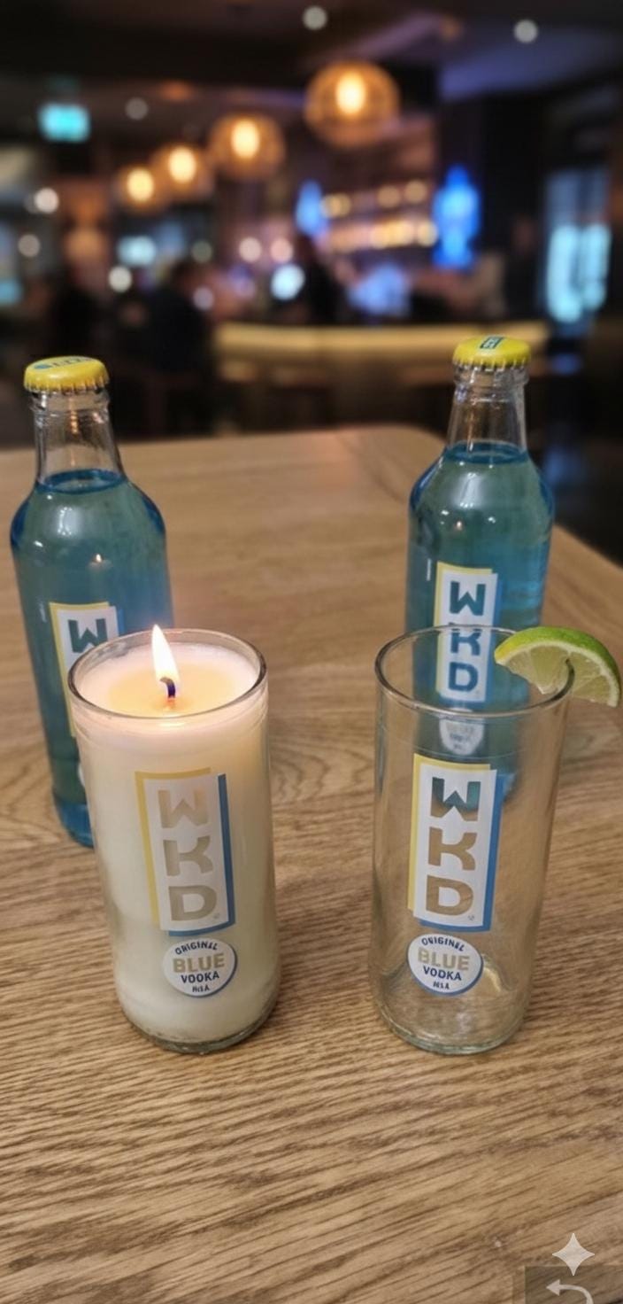 WKD Blue upcycled bottle glass Made into a candle with crackle wick