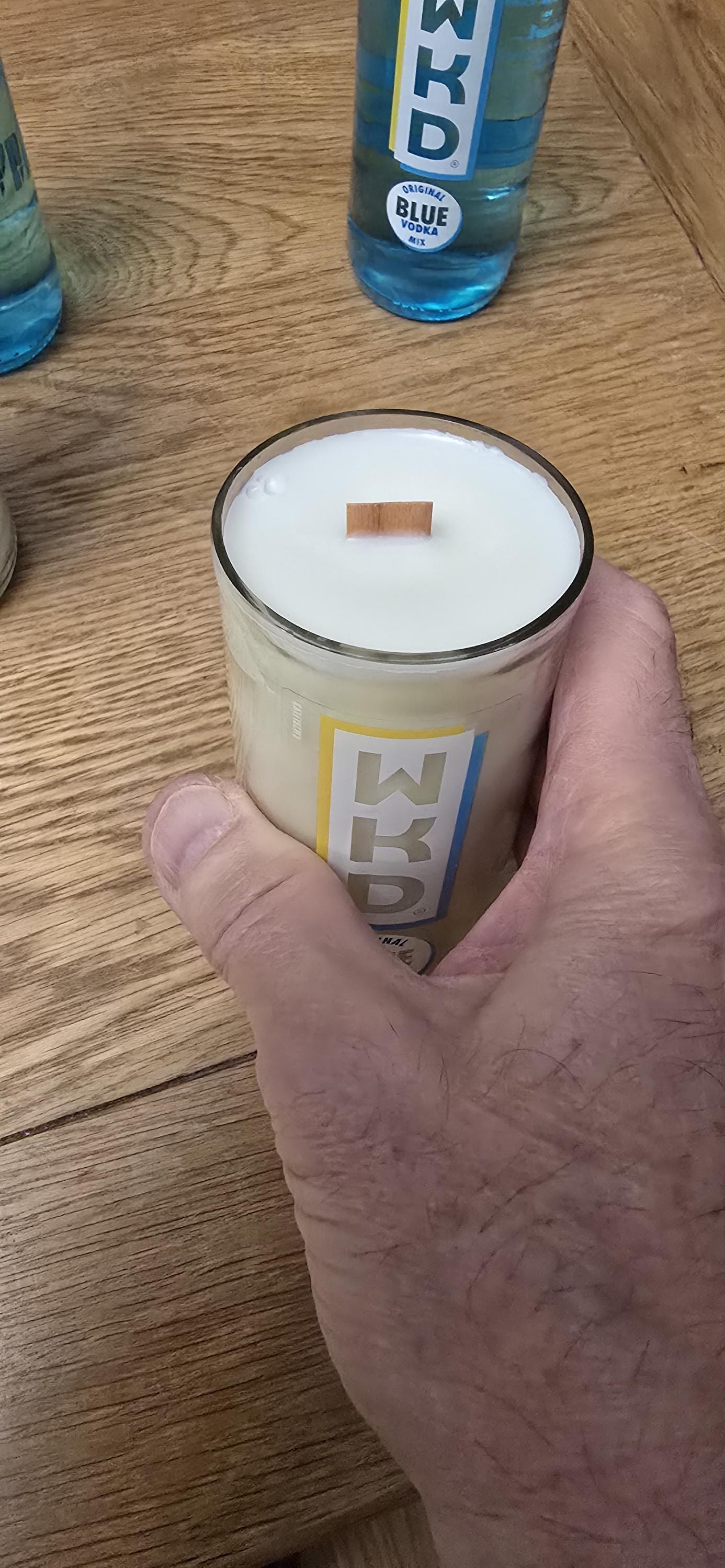 WKD Blue upcycled bottle glass Made into a candle with crackle wick